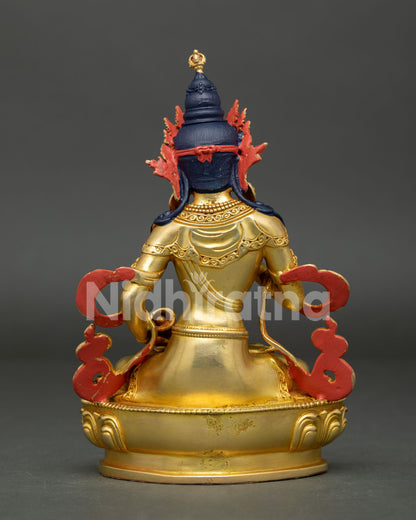 Back view of small Vajrasattva statue showing traditional Nepalese Buddhist craftsmanship