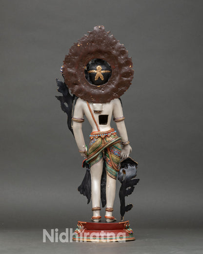 back view of standing chenrezig statue with detailed halo and hand-painted designs