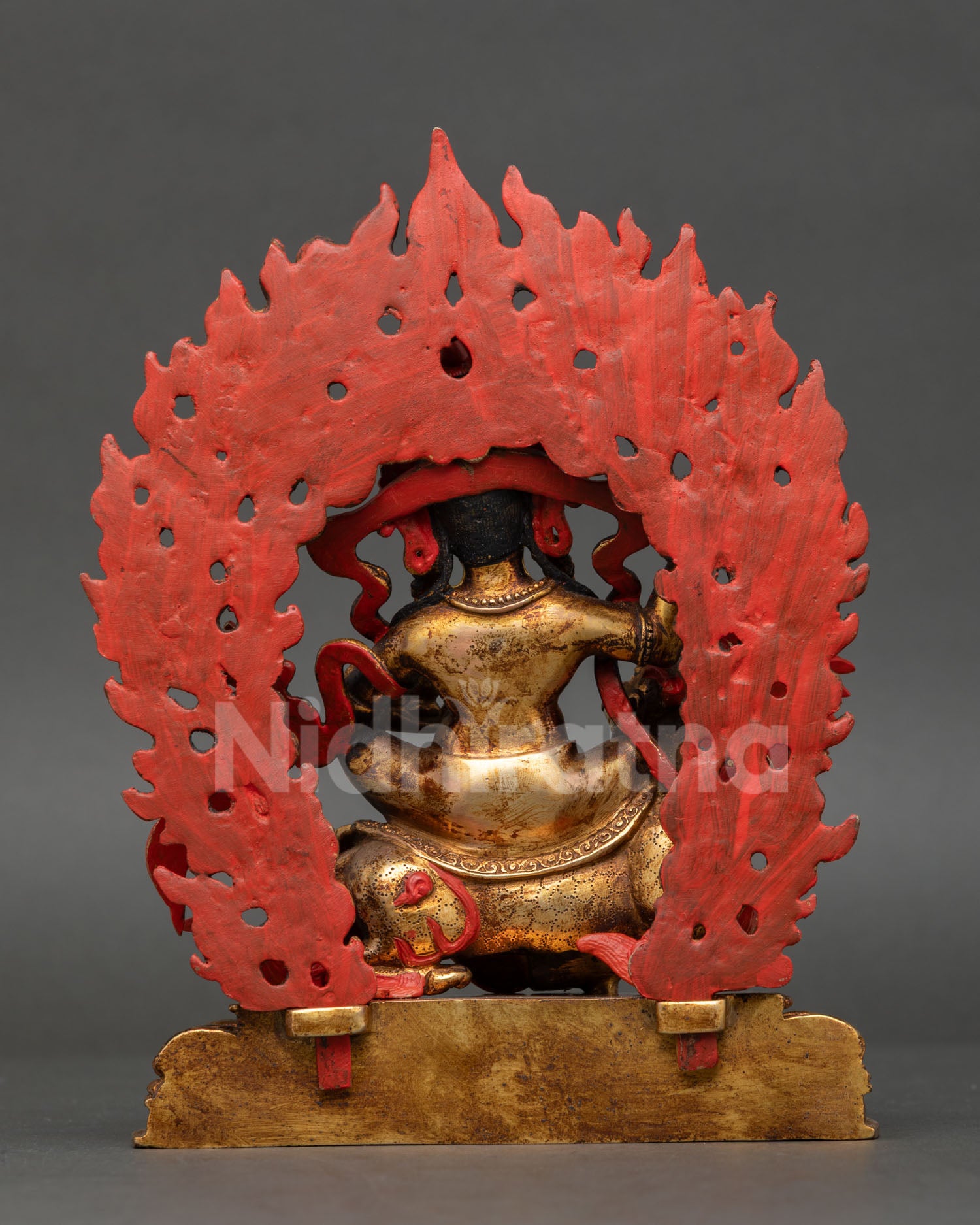 back view of Tashi Tseringma statue showing ornate halo and traditional Himalayan design