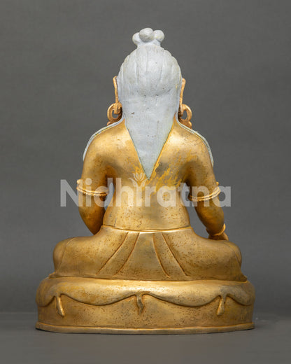 Back view of Thang Thong Gyalpo Statue with finely carved robes and traditional craftsmanship