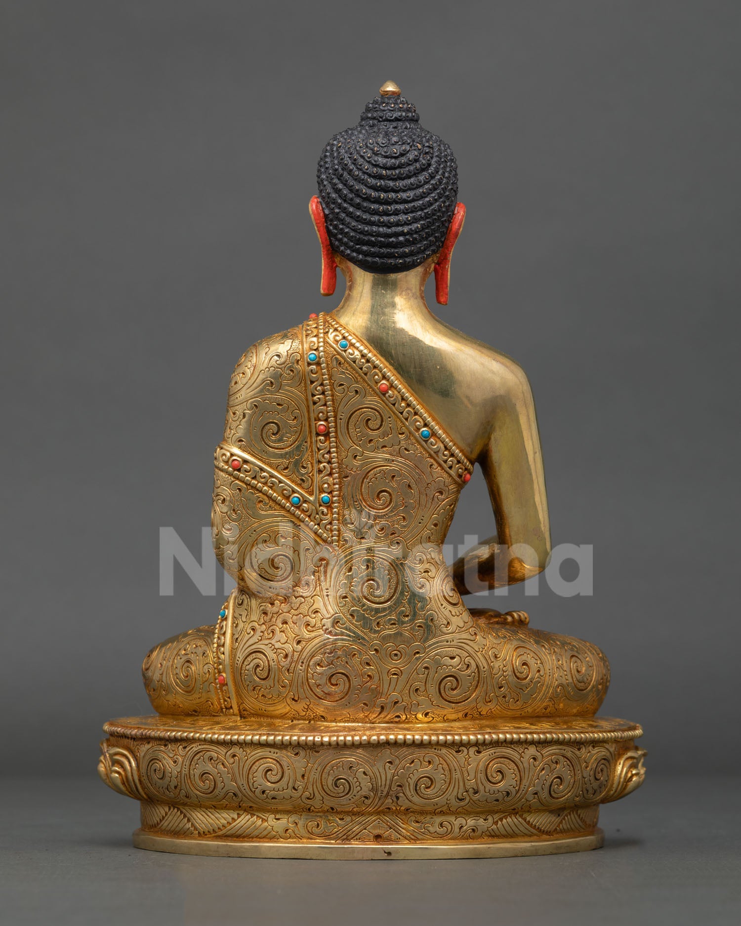 Back view of the authentic handmade copper Amitabha Buddha statue from Patan, Nepal.