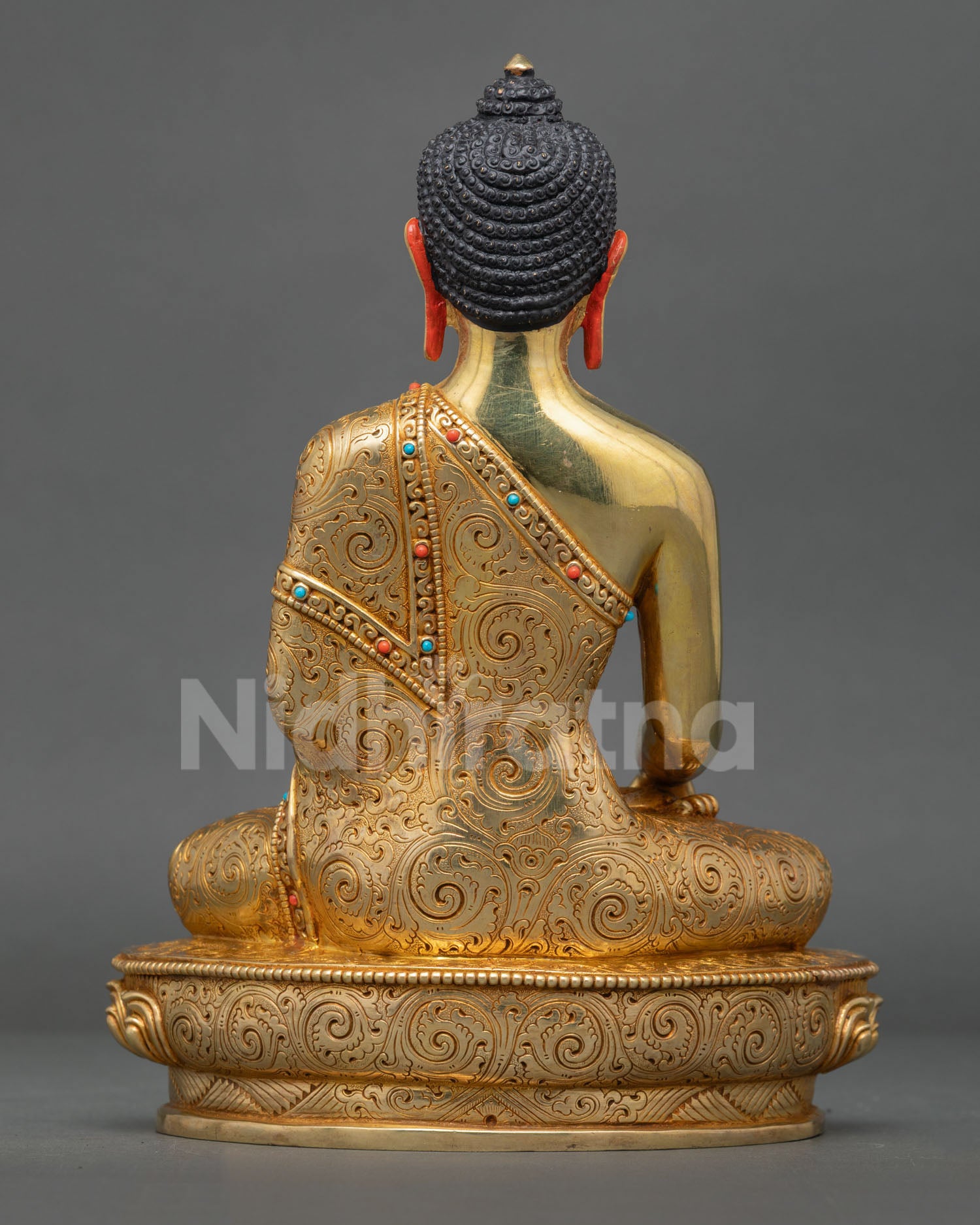 Back view of the authentic Shakyamuni Buddha statue showing the hollow consecration chamber layout.