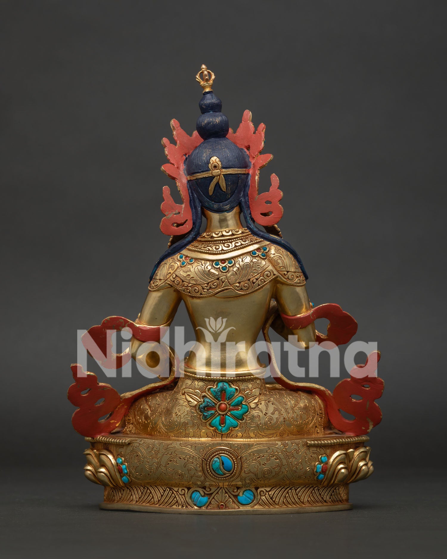 Back view of the handmade Vajrasattva statue, showcasing the polished gold finish and copper alloy casting.