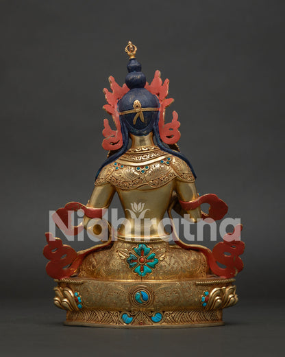 Back view of the handmade Vajrasattva statue, showcasing the polished gold finish and copper alloy casting.