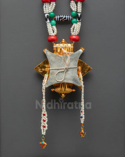 Back view of Tibetan Ghau Mala sacred necklace showing detailed craftsmanship and traditional Himalayan amulet design
