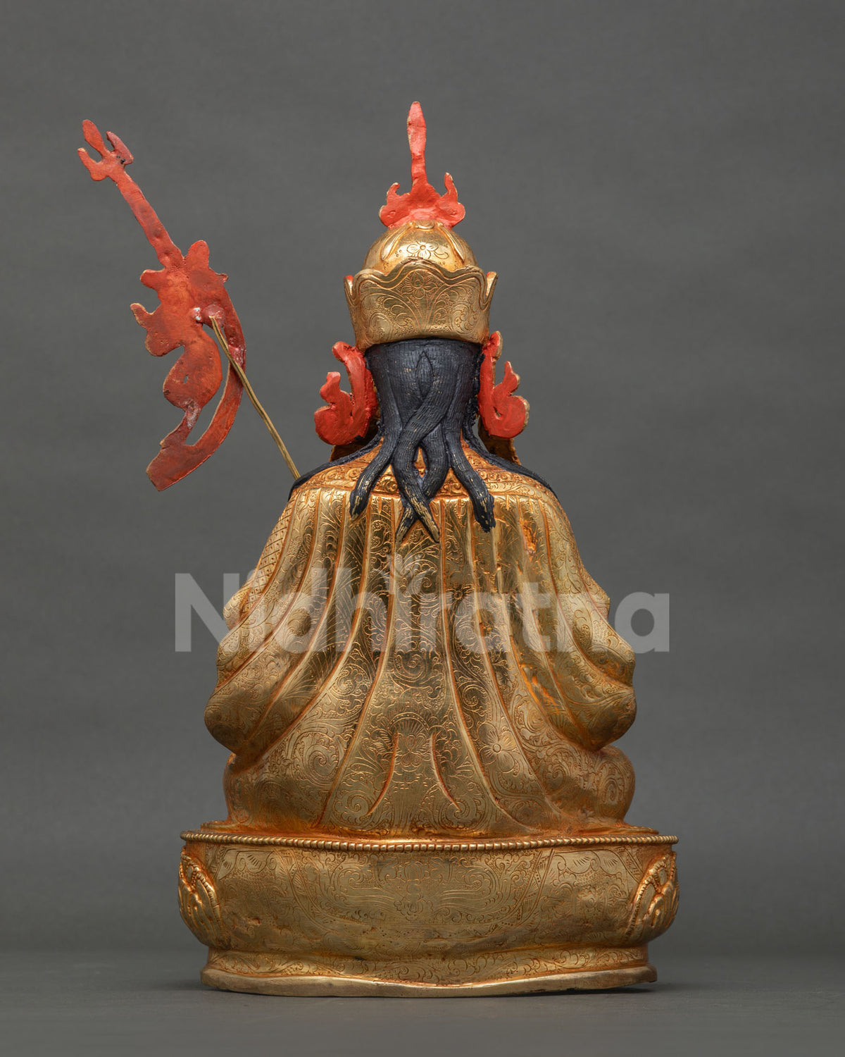 Back view of Tsokye Dorje statue with fine engraved robe and detailed hair