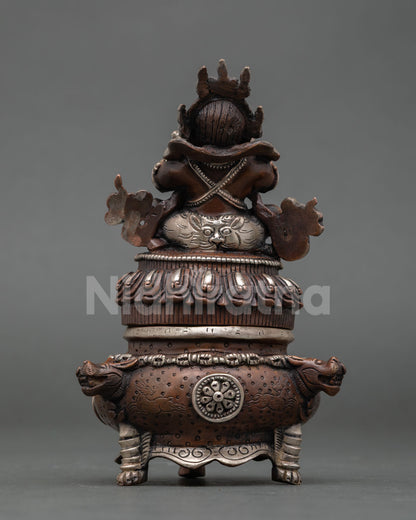 back view of vajradaka statue with incense burner base and detailed carvings