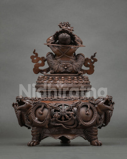 Back view of Vajradaka statue with lion-head and dragon incense burner base