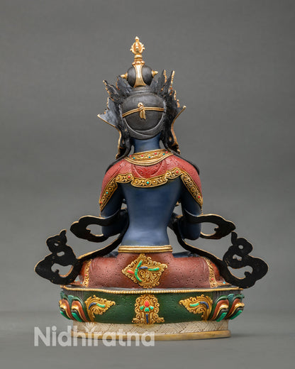 Back view of Vajradhara statue highlighting intricate lotus base, flowing ornaments, and authentic lost wax casting copper craftsmanship from Nepal