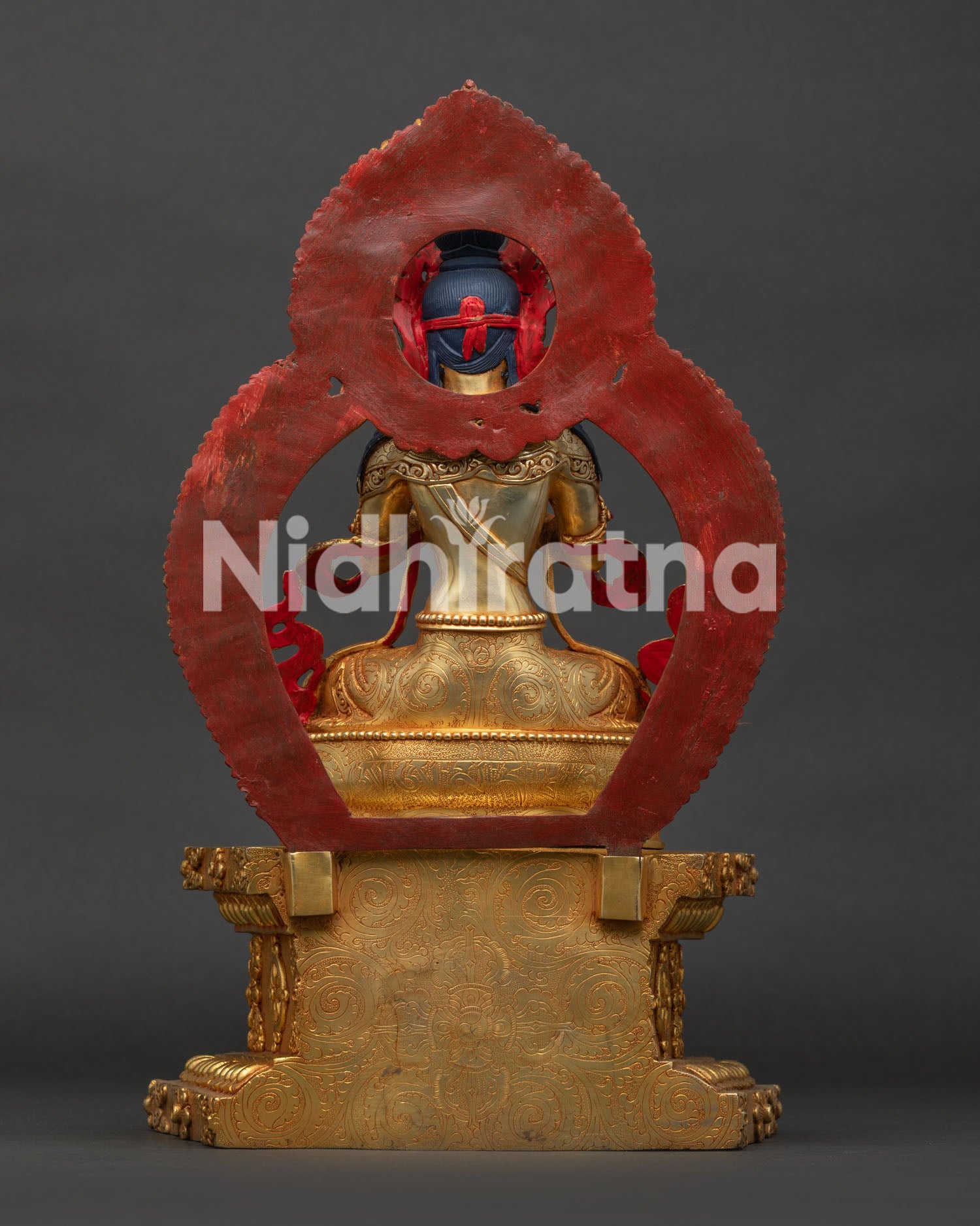 Back view of Vajradhara Statue showing handcrafted copper casting and artistic details