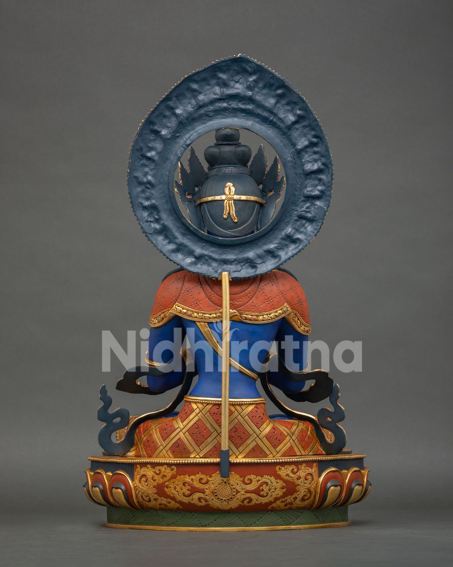 Back view of Vajradhara Statue with detailed halo and handcrafted copper design
