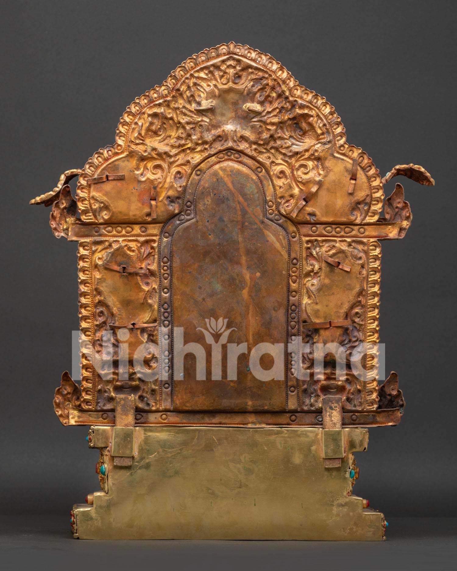 back view of vajradhara statue with intricate aureole and hand chased details