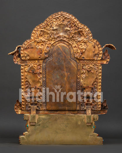 back view of vajradhara statue with intricate aureole and hand chased details