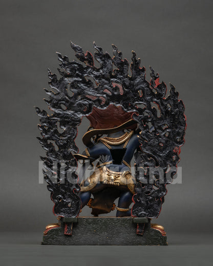 Back view of Vajrapani Statue showing hand-carved flame halo detailing
