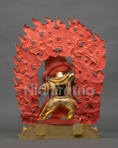 Back view of Vajrapani statue showing hand-painted halo, fiery hair and gold-gilded copper base