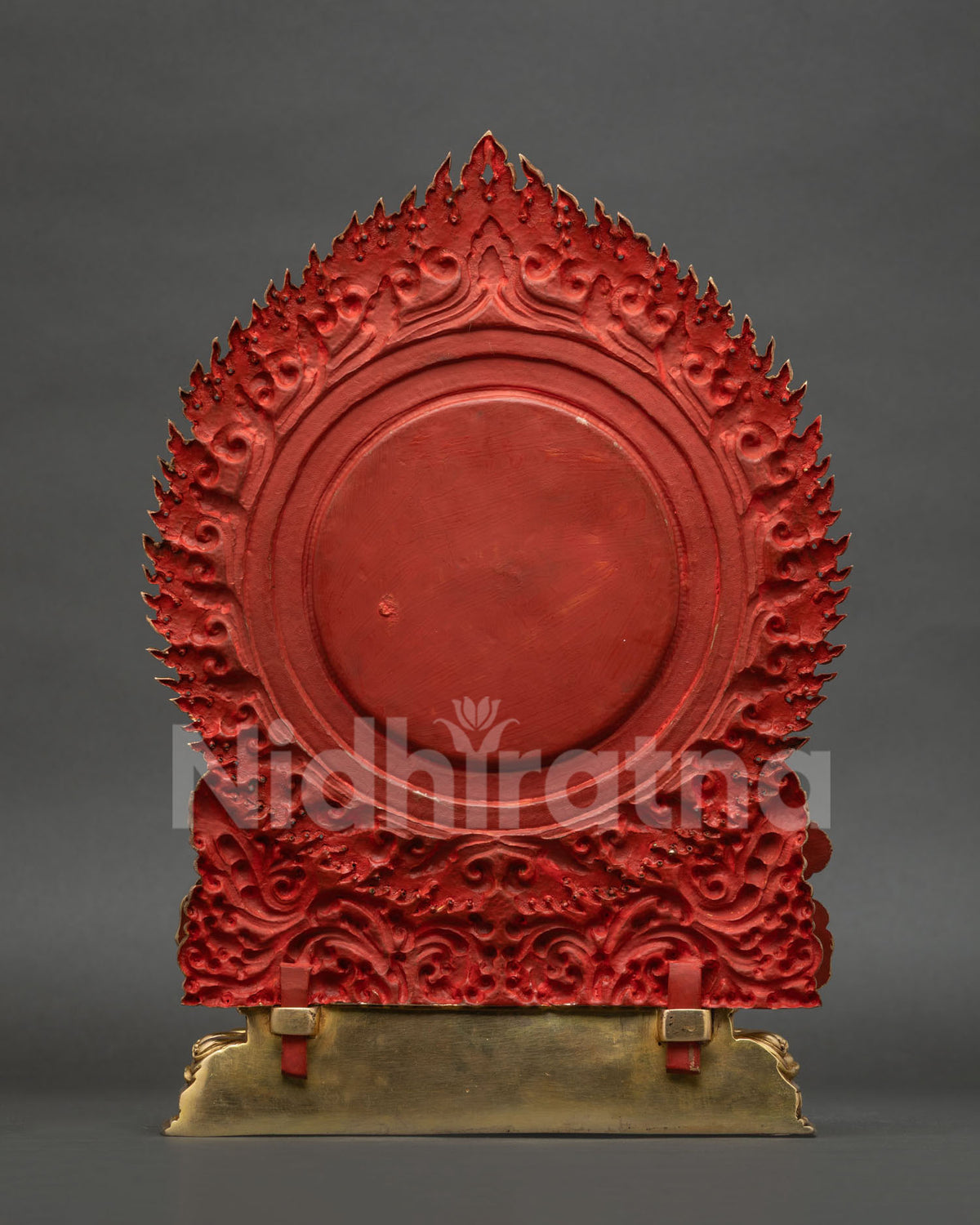 Back view of Vajrapani statue with red painted flame halo and gold gilded copper base