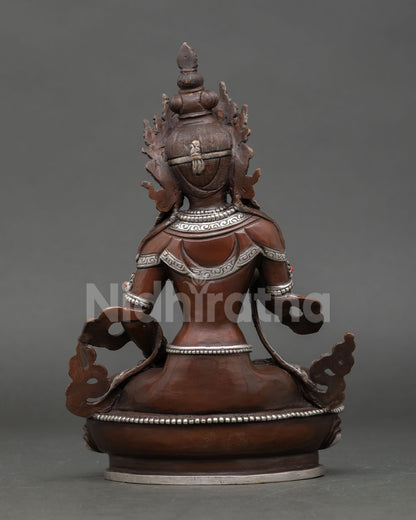 Back view of Vajrasattva Buddhist statue, Nepalese artisan metalwork
