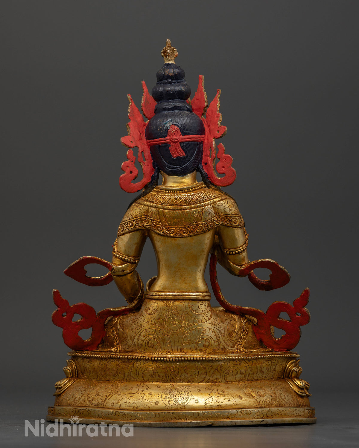 Back view of Vajrasattva statue handcrafted using traditional lost wax casting in Nepal