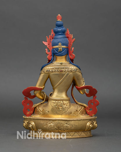 Back view of Vajrasattva statue showing halo, robe folds, and Nepalese craftsmanship