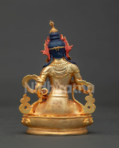 Back view of Vajrasattva statue showing intricate ornaments and fine Newari craftsmanship from Patan.