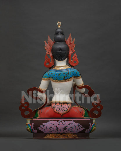 Back view of Vajrasattva statue showing lotus pedestal and copper craftsmanship
