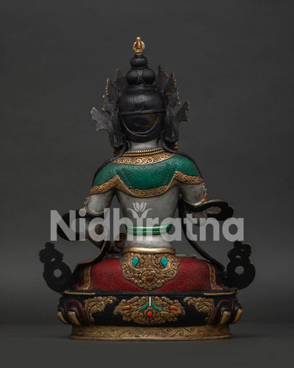 Back View of Vajrasattva Statue with Intricate Himalayan Buddhist Ornaments.