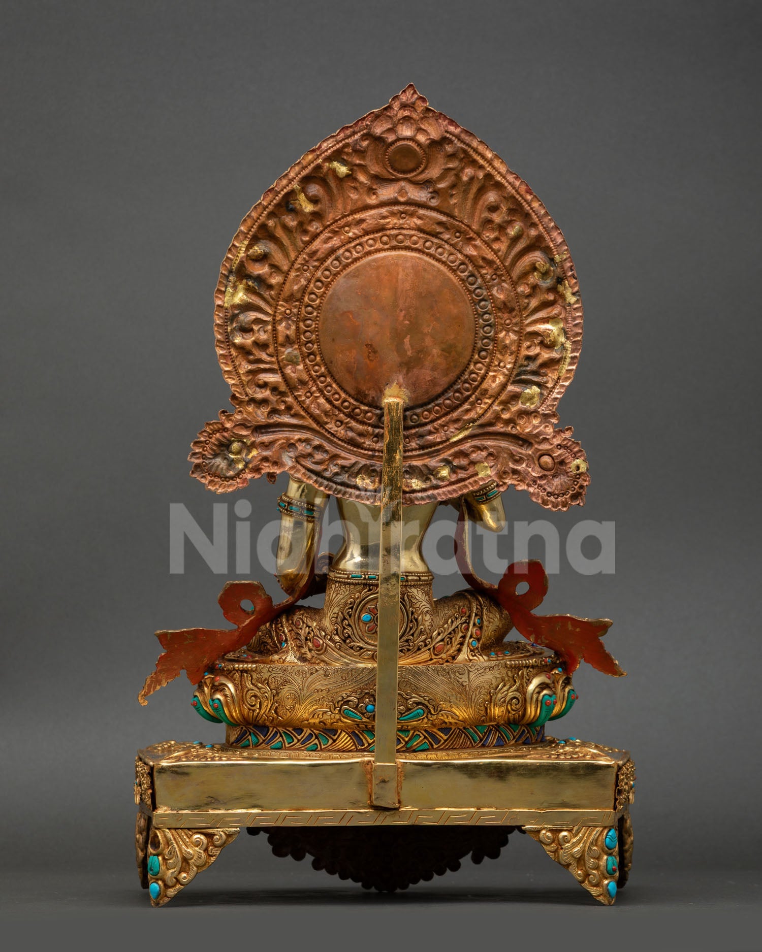Back view of Vajrasattva with throne showing repoussé carvings and detailed halo