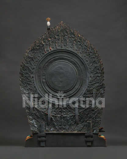 Back view of Vajrayogini statue showing flame halo and lost-wax casting detail