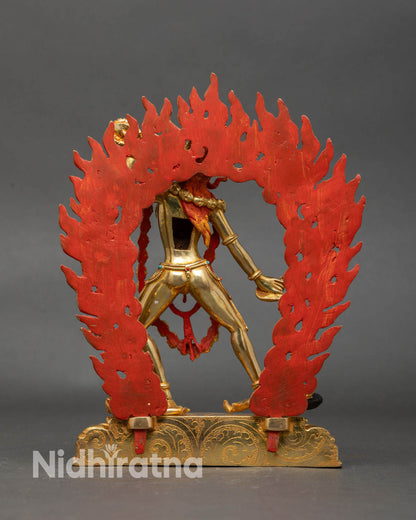 Back view of Vajrayogini statue as a wrathful dakini with spiritual decor.