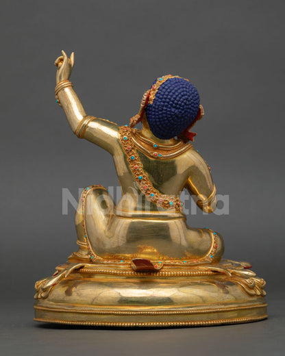 Back view of Virupa Mahasiddha statue with ornate lotus seat deer skin motif and Nepal craftsmanship