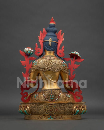 Back view of White Tara statue, gold-gilded copper sculpture from Nepal
