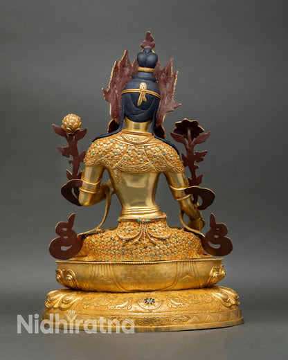 Back view of White Tara statue Nepalese handmade spiritual sculpture for meditation altar healing practice and devotional Buddhist decor
