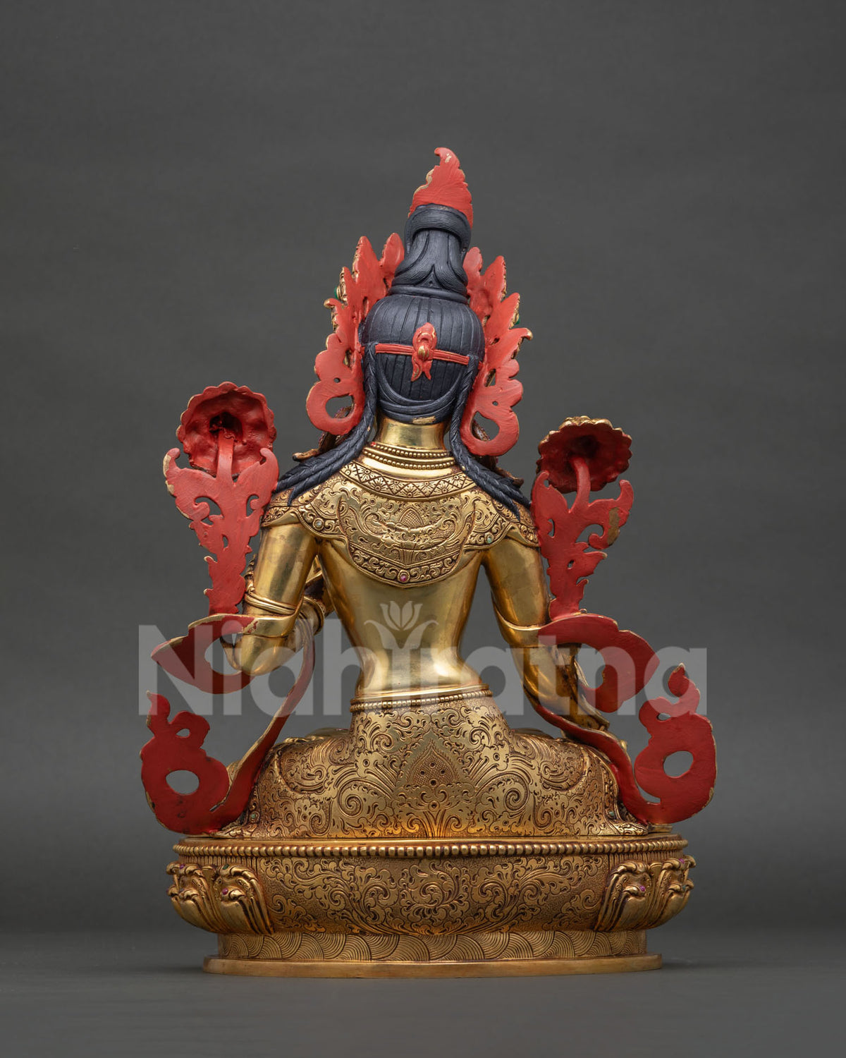 Back view of White Tara Statue showing intricate hand-engraved copper craftsmanship