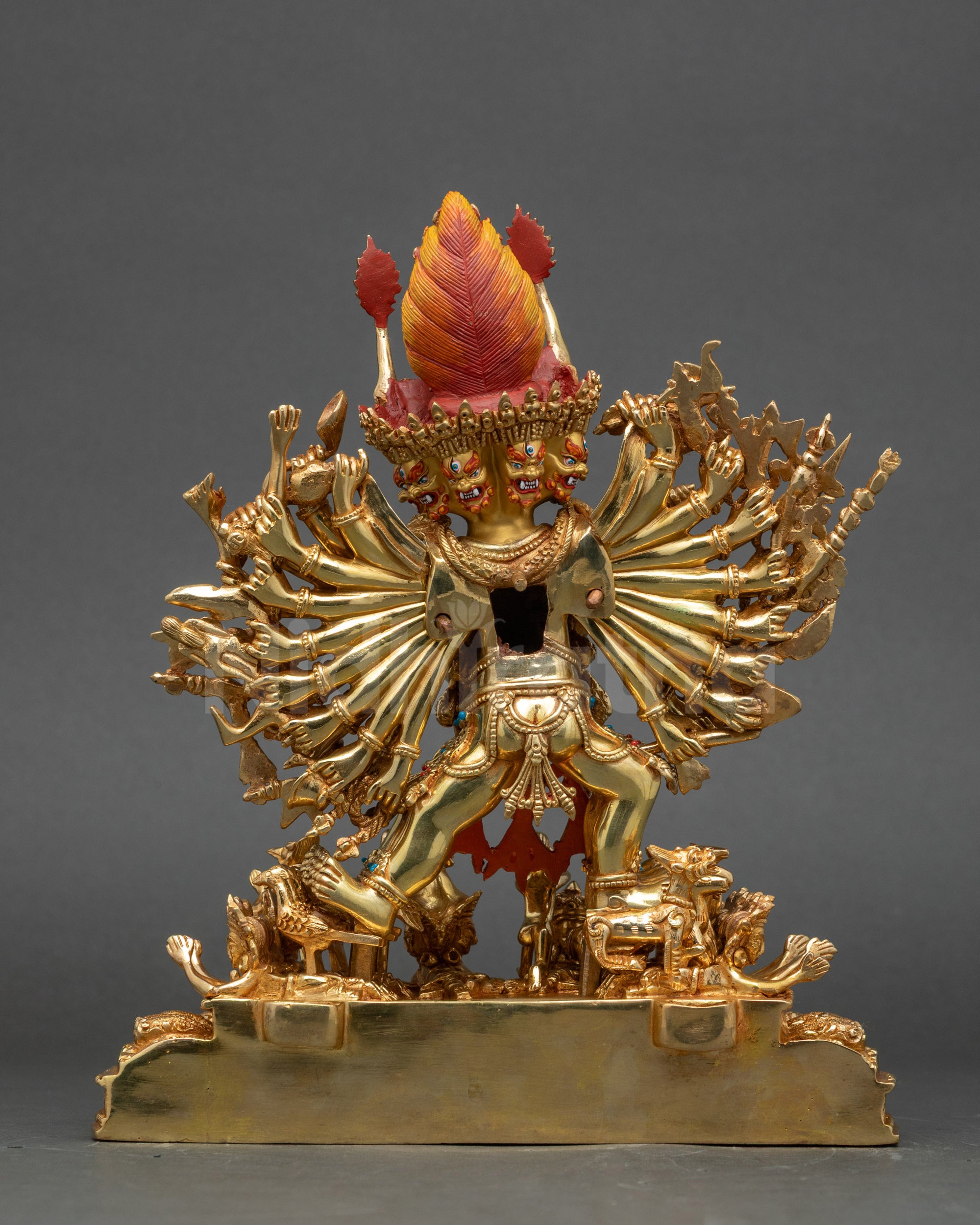 Back view of Yamantaka sculpture displaying crowns jewelry and ritual adornments