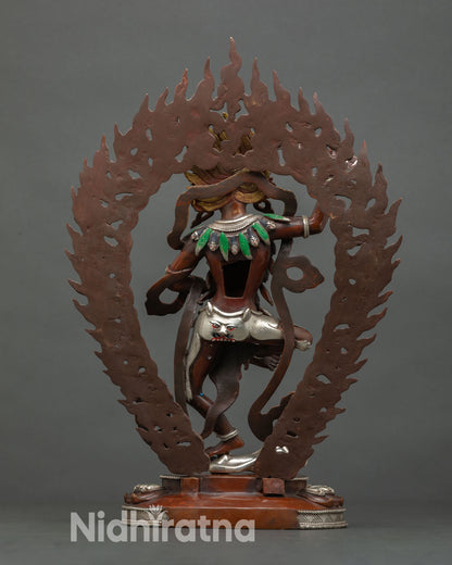 Back view vof Yeshe Walmo lotus pedestal flames copper silver plated Himalayan protector sculpture.