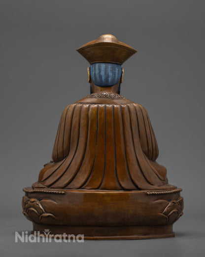 back view of zhabdrung rinpoche statue showing lotus throne and finely carved copper details