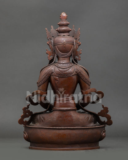 Back view of oxidized copper Amitayus Buddha statue for Buddhist altar meditation space and spiritual home decor collection