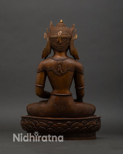 Back view of oxidized Crown Shakyamuni Buddha statue handcrafted by Newari artisans in Nepal