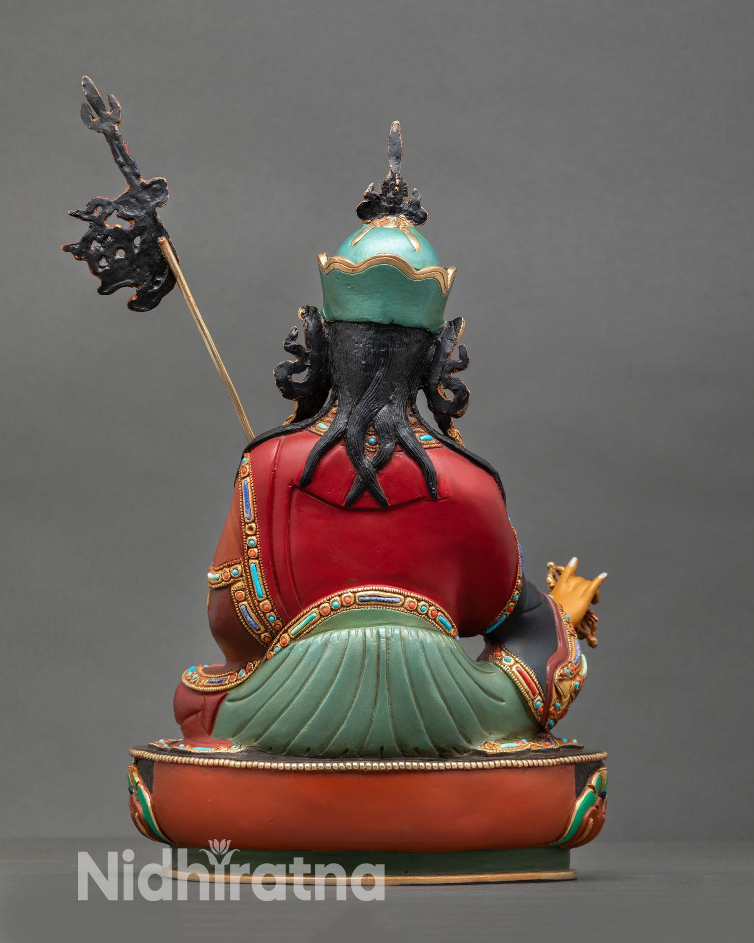 Back view of Padmasambhava statue, handcrafted Nepal copper artwork, gold gilded finish, detailed kasaya robes, spiritual decor sculpture