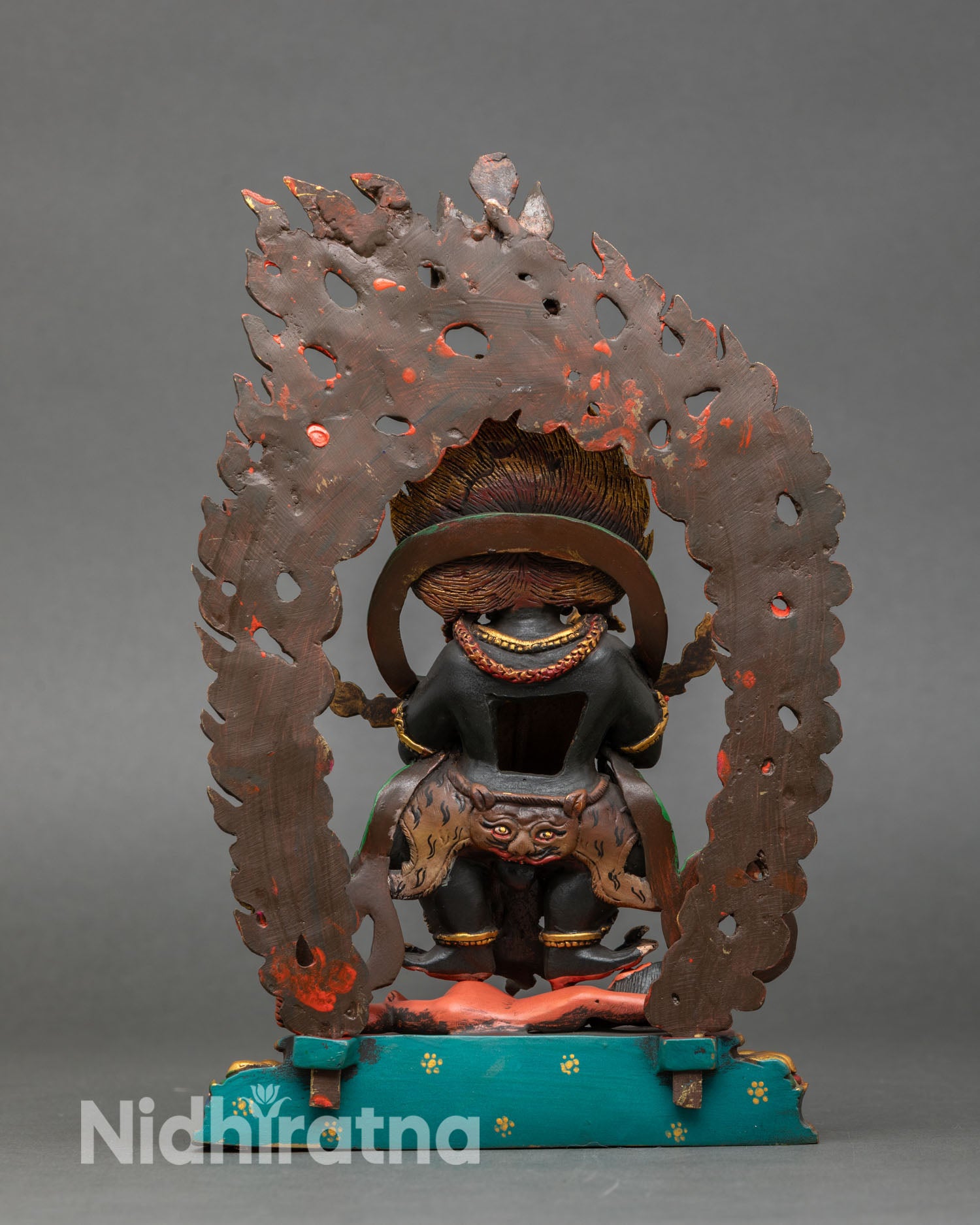 Back view of Sakya Mahakala statue ornate halo lotus pedestal wrathful Tibetan Buddhist sculpture