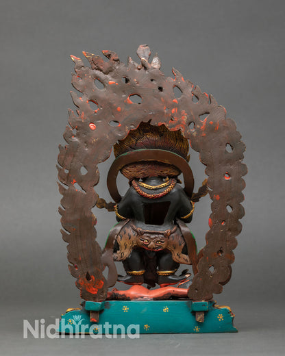 Back view of Sakya Mahakala statue ornate halo lotus pedestal wrathful Tibetan Buddhist sculpture