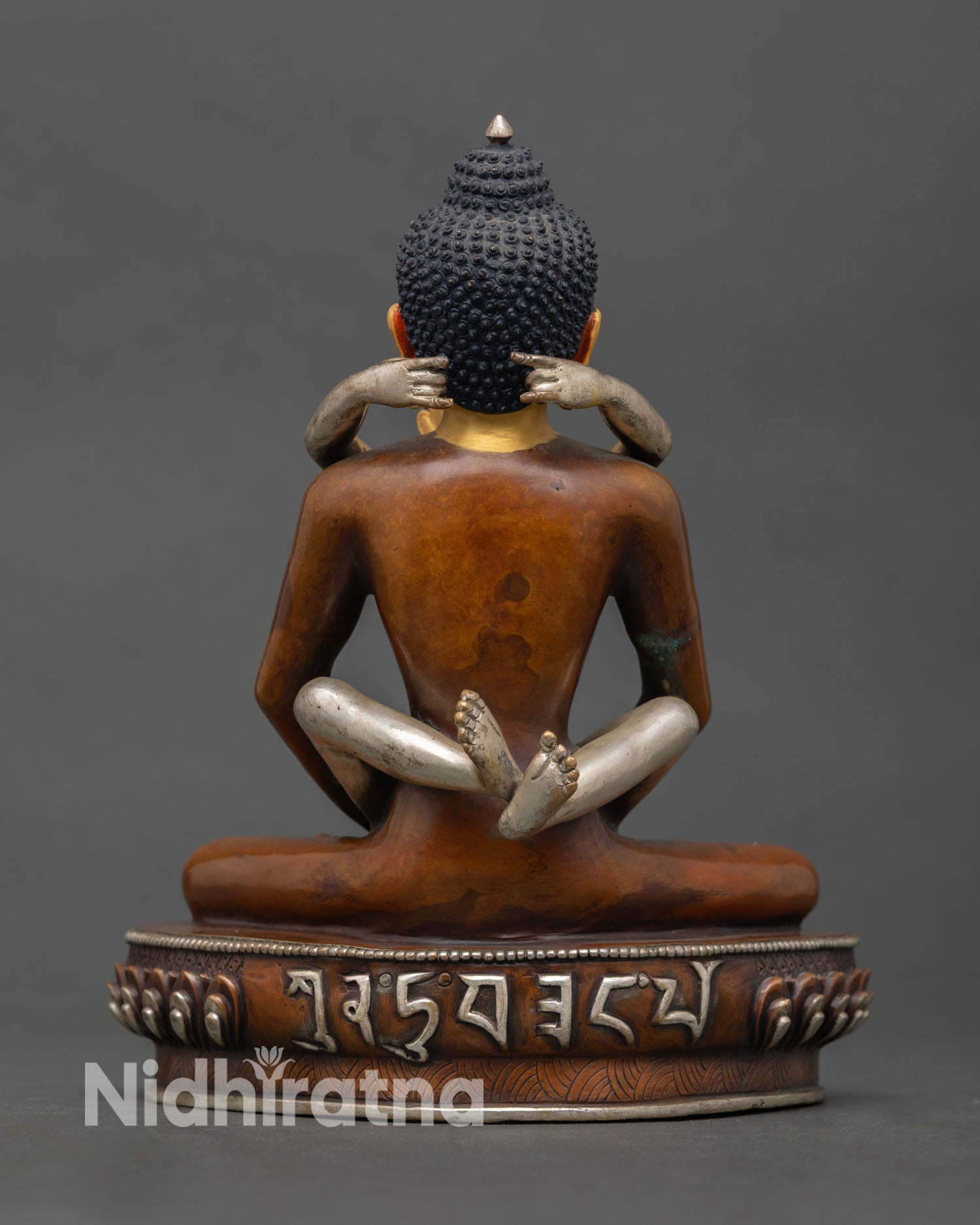 Back view of Samantabhadra consort statue oxidized finish silver detailing Himalayan Buddhist art