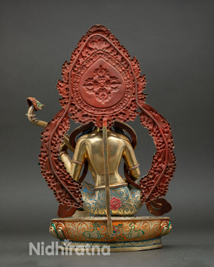 back view saraswati statue, detailed halo design and carved lotus seat
