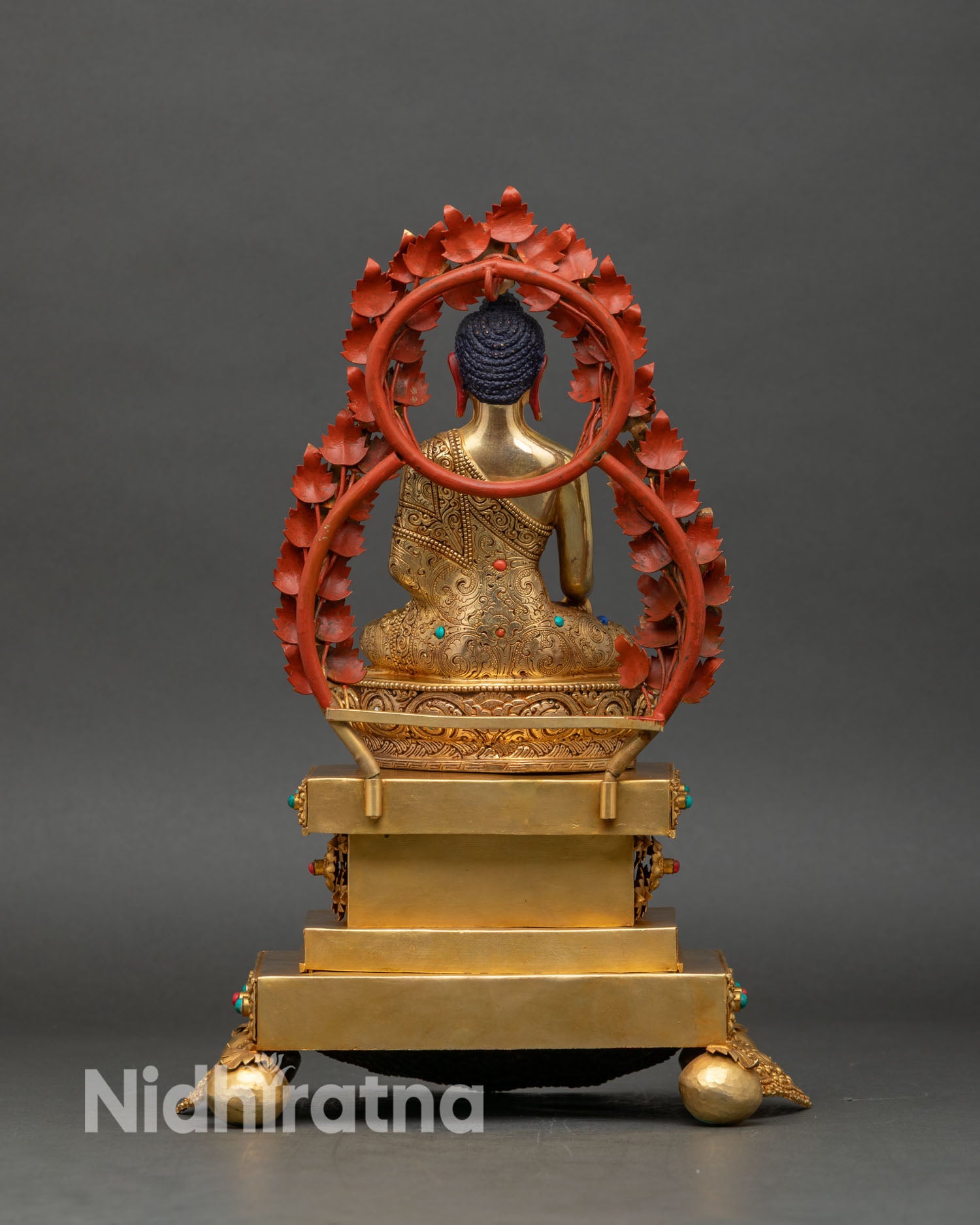 Back view of Shakyamuni Buddha copper gold gilded sacred Himalayan metalwork statue Nepal