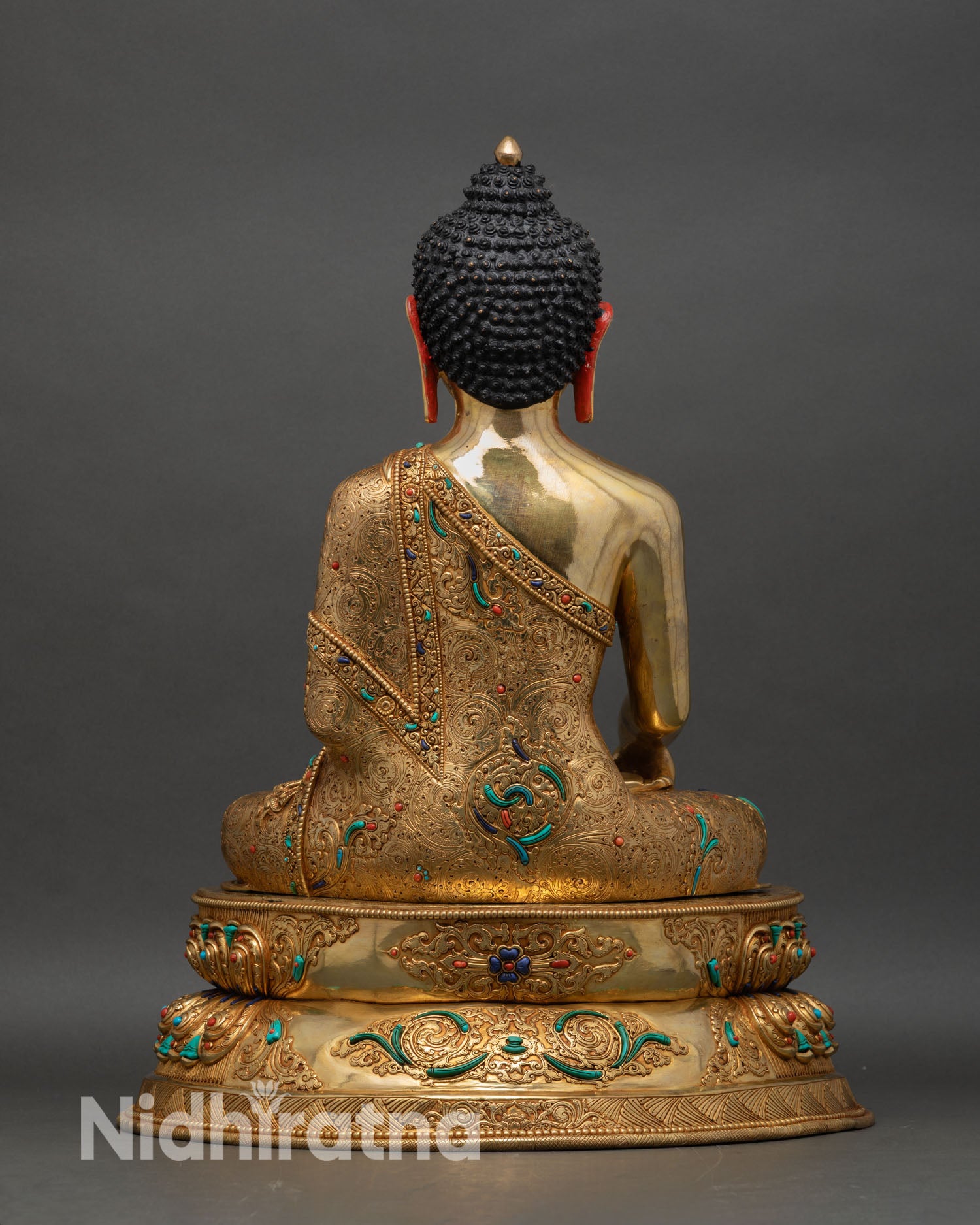 back view shakyamuni buddha statue, detailed lotus base and handcrafted finish