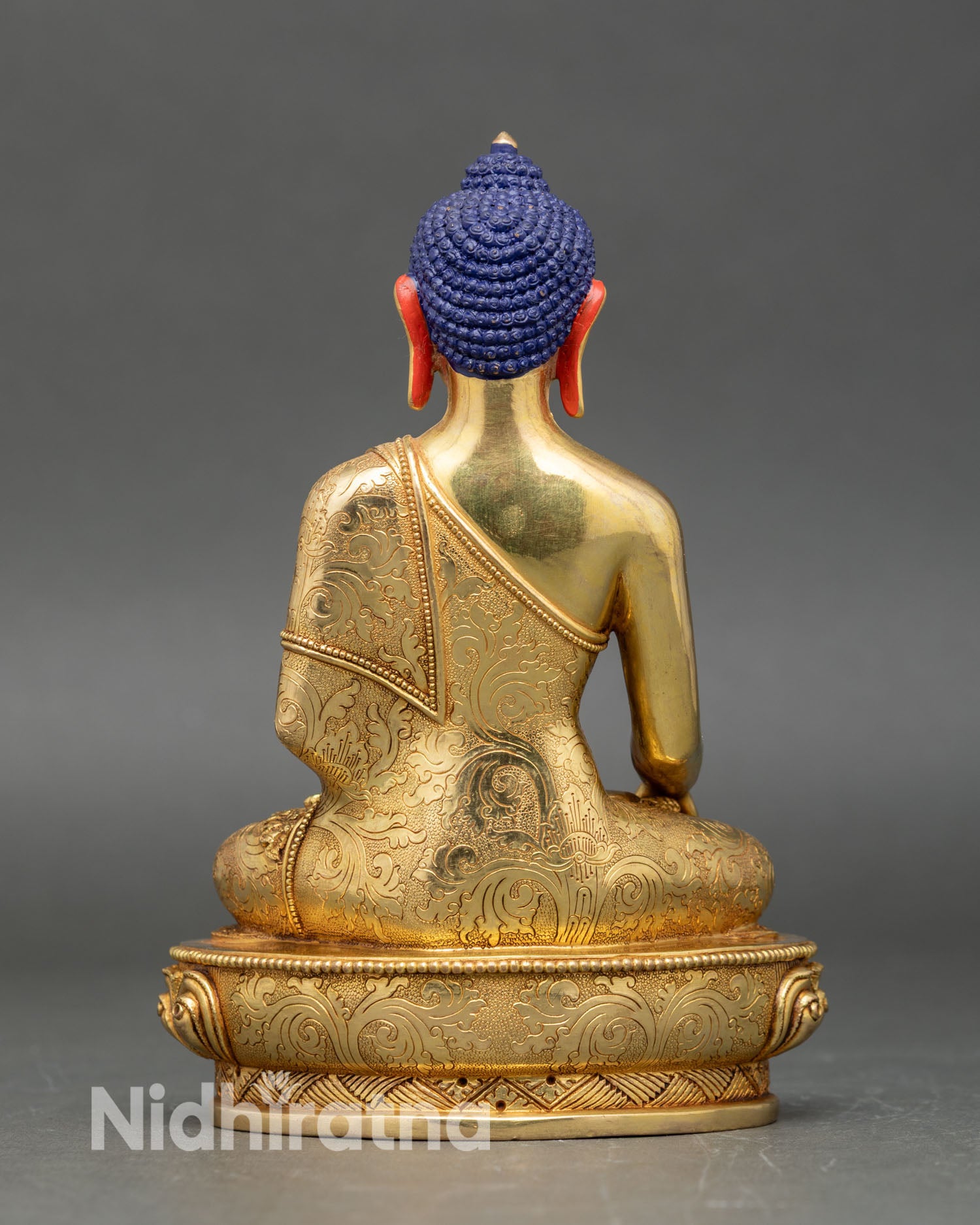 Back view Shakyamuni Buddha statue detailed robes ornate jewelry handcrafted in Nepal