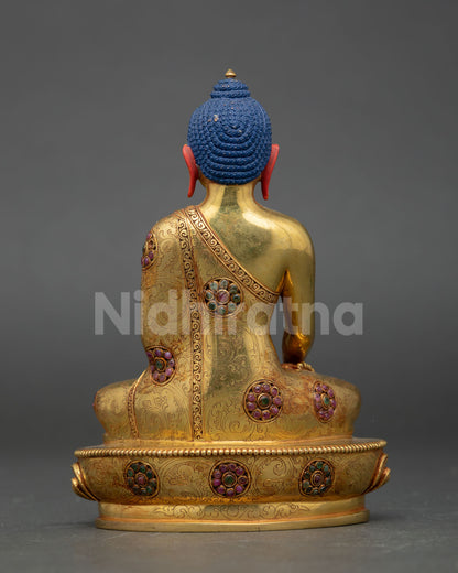 back view shakyamuni buddha statue engraved lotus throne detailing copper nepal buddhist art