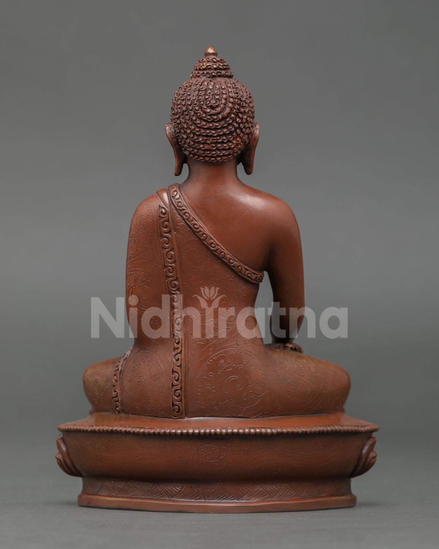 Back view of Shakyamuni Buddha statue, copper oxidized finish, Himalayan Buddhist art  shrine decor, Enlightened Buddha sculpture