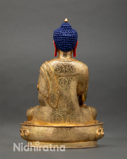 Back view of Shakyamuni Buddha statue showing detailed robes and gold finish Nepal handmade Buddhist sculpture for home shrine decor and spiritual interior