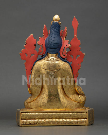 Back view of Tibetan Dharma King statue with utpala flowers Prajnaparamita Sutra and wisdom sword for meditation and spiritual decor